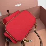 Miu Miu Canvas and Leather Backpack